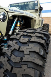 Close-up of 250096 M.T. Street 35X13.50-17Lt Baja Pro Xs tire on an off-road vehicle, showcasing its rugged tread pattern and durable construction designed for superior traction and handling on various terrains, ideal for RV, Automotive, Powersports, off-road, marine, exterior, truck accessories, interior, truck bed, rv parts, AVADA - Best Sellers,Must Haves