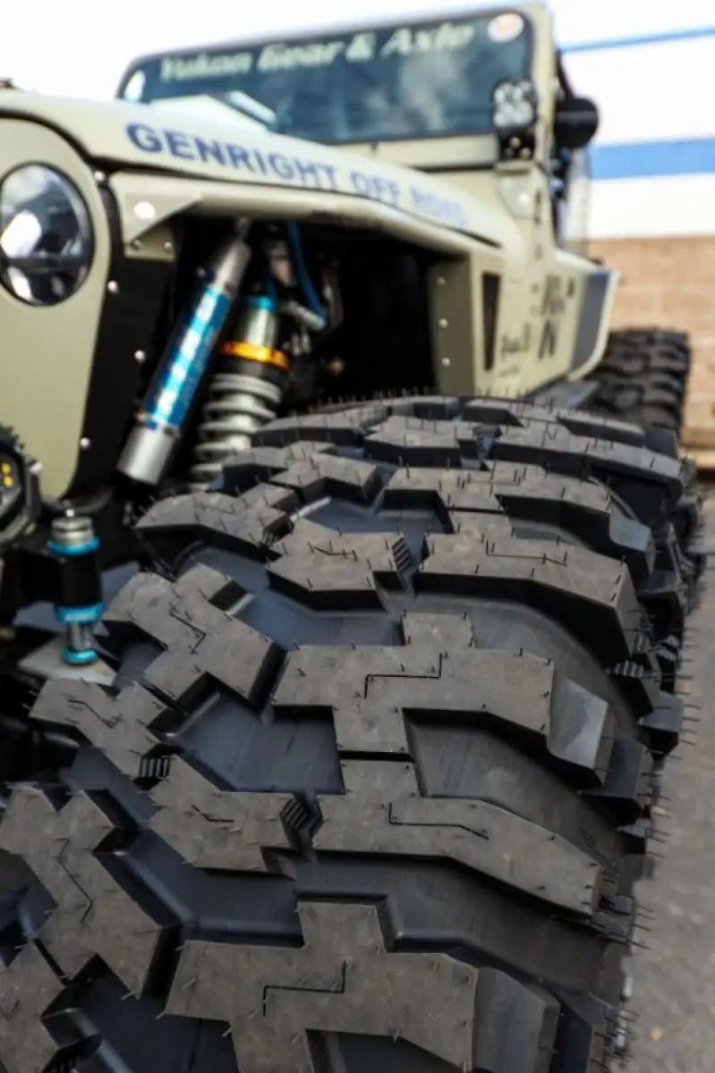 Close-up of 250096 M.T. Street 35X13.50-17Lt Baja Pro Xs tire on an off-road vehicle, showcasing its rugged tread pattern and durable construction designed for superior traction and handling on various terrains, ideal for RV, Automotive, Powersports, off-road, marine, exterior, truck accessories, interior, truck bed, rv parts, AVADA - Best Sellers,Must Haves