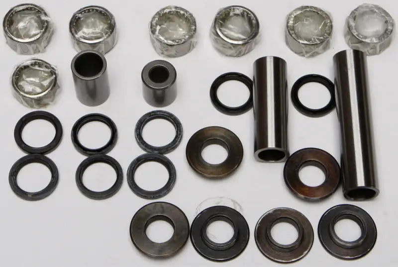 Complete linkage bearing kit with pivot bearing and seal components for easy repairs