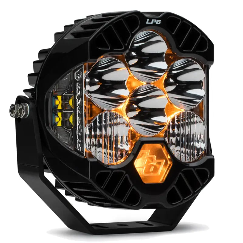 Baja Design LP6 Pro LED work light with black hexagonal design and orange accents