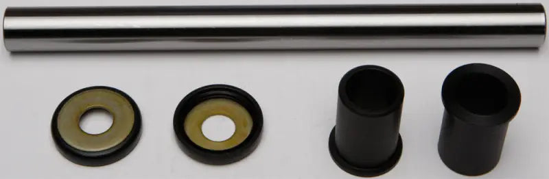 Metal shaft with washers and black bushings from 28-1010 Swingarm Bearing Kit