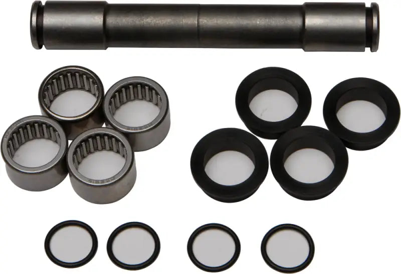 Swingarm bearing kit with metal and rubber bearings, bushings, and seals for a shaft