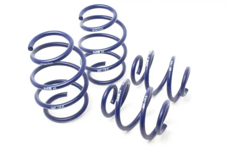 Four blue automotive suspension springs for AMG Ride Control system in H&R 12 22