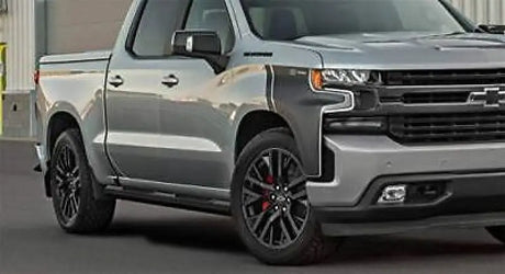 Silver Chevrolet pickup truck with Maxway Octa Series step bar for easy access