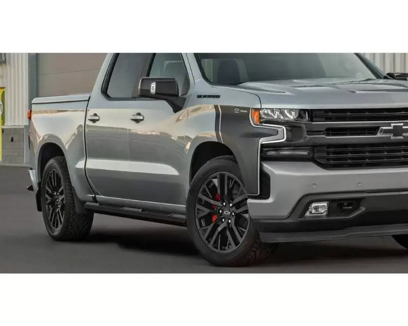 Silver Chevrolet Silverado pickup truck with Maxway Octa Series step bar for cool style