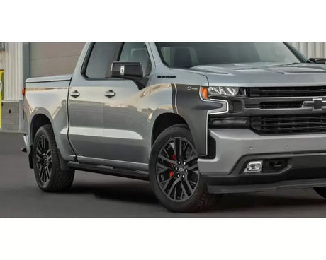 Silver Chevrolet Silverado pickup truck with Maxway Octa Series step bar for cool style
