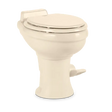 Beige Dometic Toilet Permanent with pedal flush control for easy use