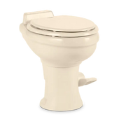 Beige Dometic Toilet Permanent with pedal flush control for easy use