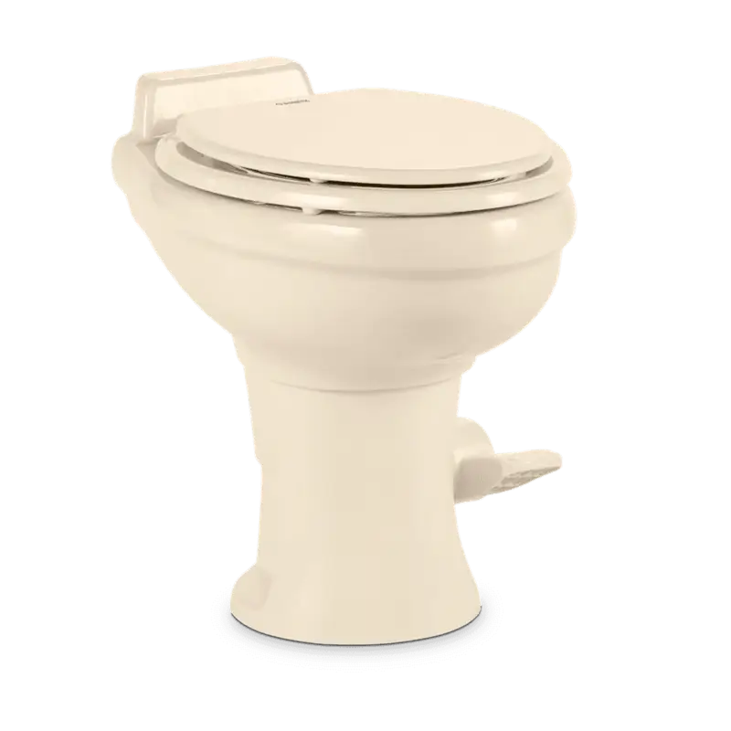 Beige Dometic Toilet Permanent with pedal flush control for easy use