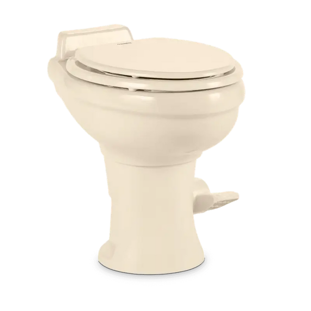 Beige Dometic Toilet Permanent with pedal flush control for easy use