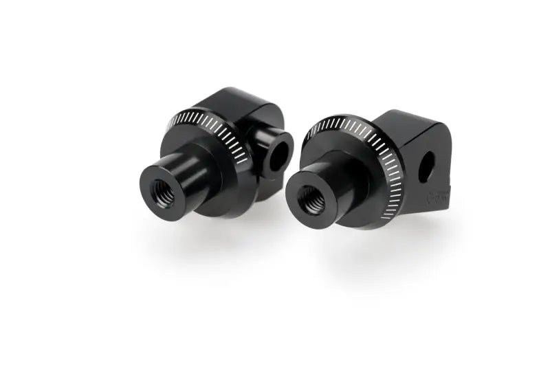 Black anodized aluminum 3661N footpeg adapter mounts with threaded holes for racing footpegs