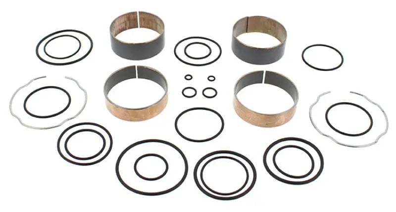 Collection of metal fork bushings and rubber O-rings in the 38-6119 Fork Bushing Kit