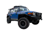 Blue off-road Toyota FJ Cruiser on Warrior Prod Rack for ultimate adventure look