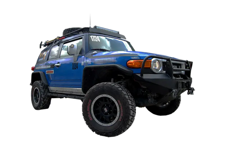 Blue off-road Toyota FJ Cruiser on Warrior Prod Rack for ultimate adventure look