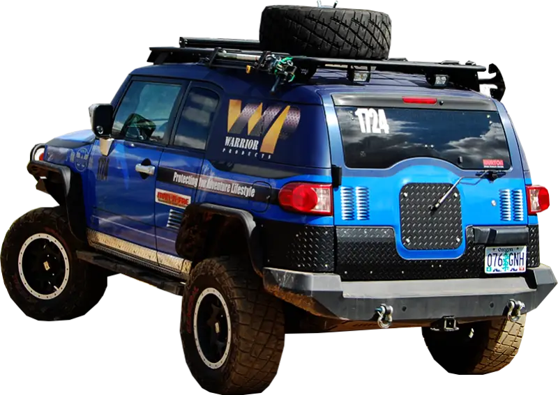 Blue off-road vehicle with roof rack on Warrior Prod Rack for tough adventures