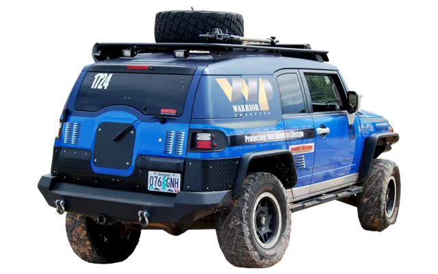 Blue off-road vehicle on Warrior Prod Rack for durable off-road gear storage