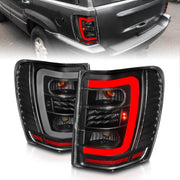 ANZO 311394 ANZO 1999-2004 Jeep Grand Cherokee LED Tail Lights w/ Light Bar Black Housing Clear Lens