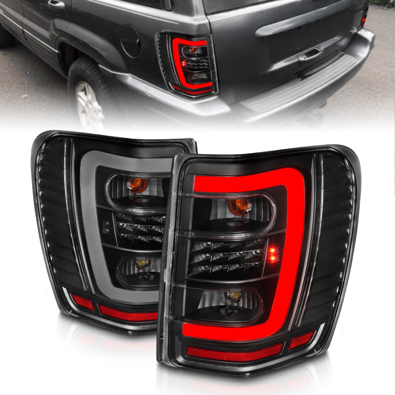 ANZO 311394 ANZO 1999-2004 Jeep Grand Cherokee LED Tail Lights w/ Light Bar Black Housing Clear Lens