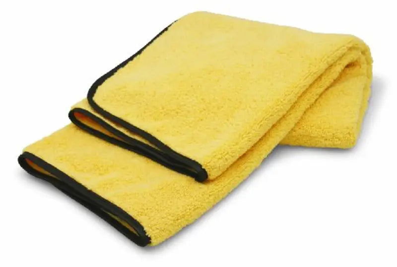 Folded yellow microfiber max towel with black trim for 40059AS Carrand Microfiber Max Su