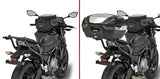 Motorcycle with matte black hard luggage mounting hardware and removable top case