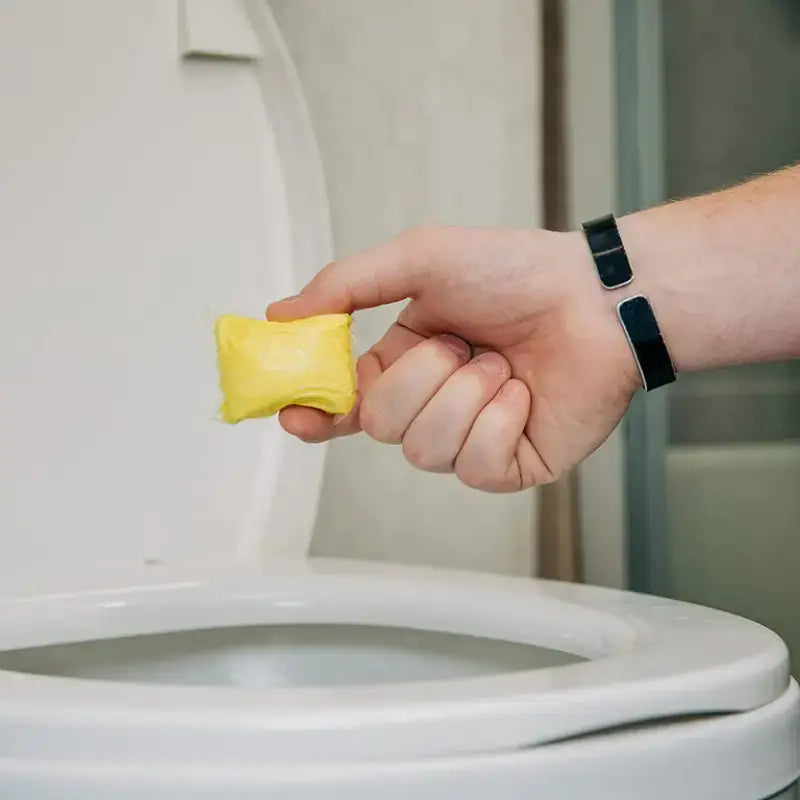 Yellow toilet bowl cleaner tablet from 41472 Camco Wild Thing #2 On The Charts Drop-I