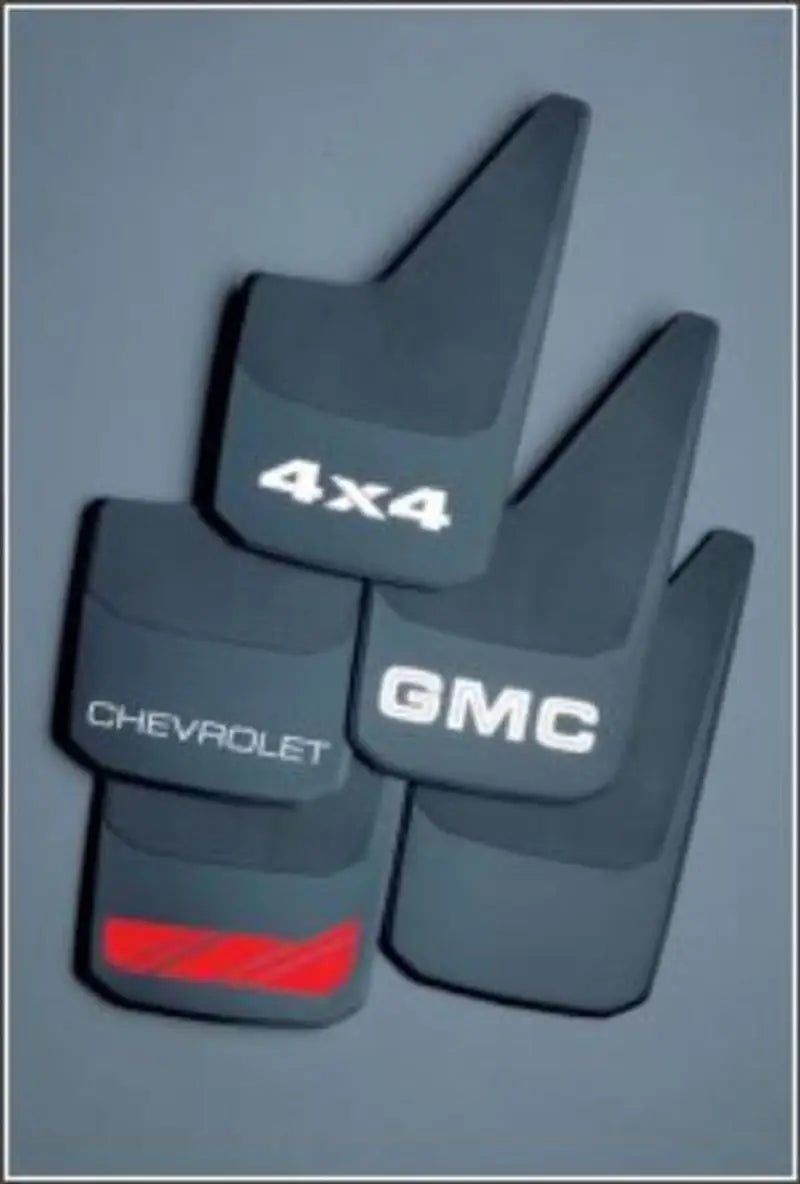 Black mud flaps with "4x4," "Chevrolet," and "GMC" logos for the 4322 Hopkins Sg Prr C Blk Plain Ru on a gray background.