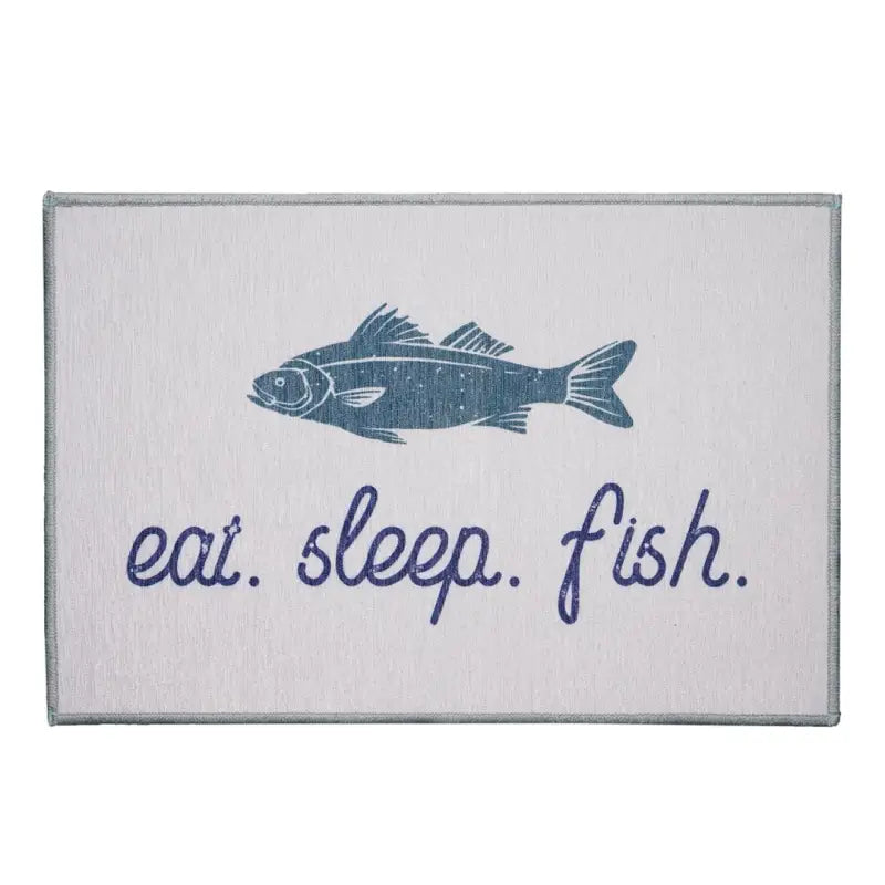 455838 Crystal Art Eat Sleep Fish Doormat featuring a blue fish graphic on a light background with "eat. sleep. fish." text, measures 27x18 inches.