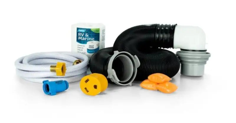 Camco 47807 Starter Kit Box for 2021 - Standard, featuring essential camping and RV items including hoses, connectors, and accessories.