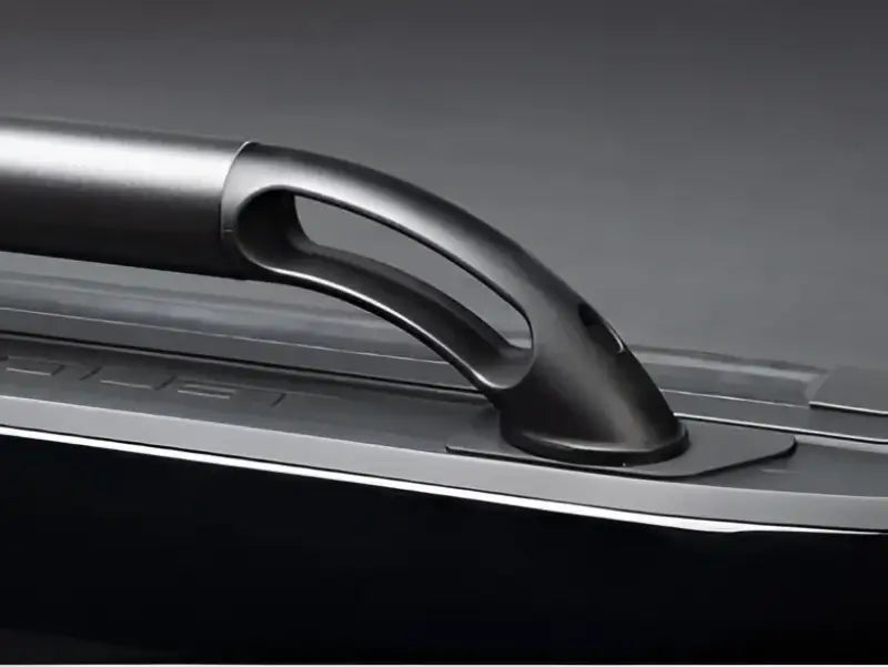 Black metal grab handle on Putco Black Nylon Boss Locker Side Rails for Jeep