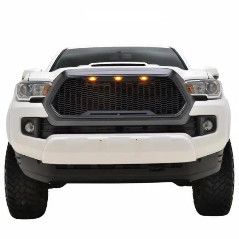 White pickup truck with Paramount Black Evomesh grille and LED lights for a bold look