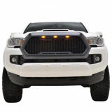 White pickup truck with Paramount Black Evomesh grille and LED lights for a bold look