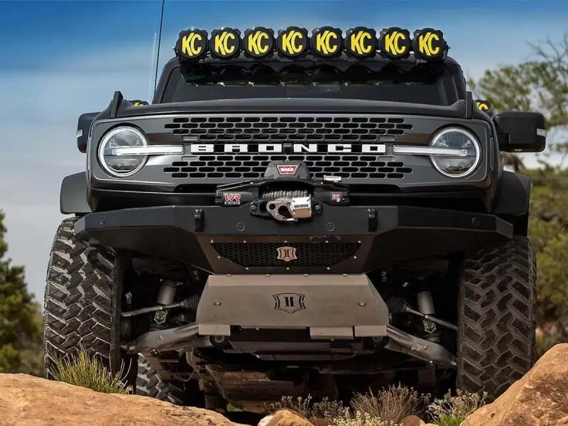 Close-up of a Bronco with the 48602 Icon 21-Up Bronco Hoss 2.0 Pkg 2.5 Front suspension package, enhancing its off-road performance. RV, Automotive, Powersports, off-road, marine, exterior, truck accessories, interior, truck bed, rv parts, AVADA - Best Sellers