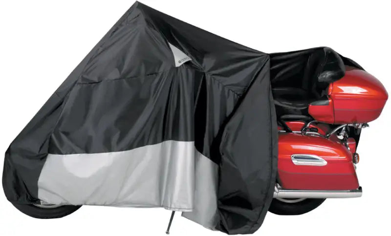 Motorcycle protected by Cover Weatherall Pluz Ez Zip tarp with black and silver design