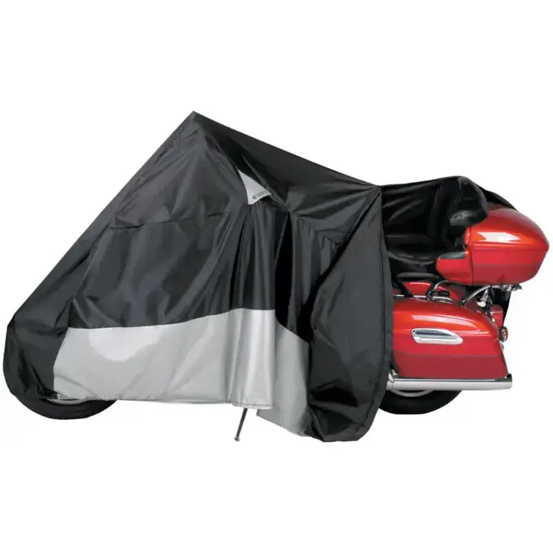Motorcycle protected by Cover Weatherall Pluz Ez Zip tarp with black and silver design