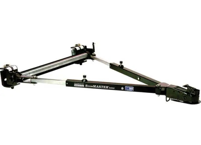 Black and silver Snowmaster 1000 plow with adjustable arms on Roadmaster Tow Bar Class IV