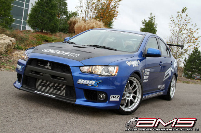 AMS.04.09.0001-1 AMS Performance 08-15 Mitsubishi EVO X Front Mount Intercooler w/Modular Cast End Tanks & Logo