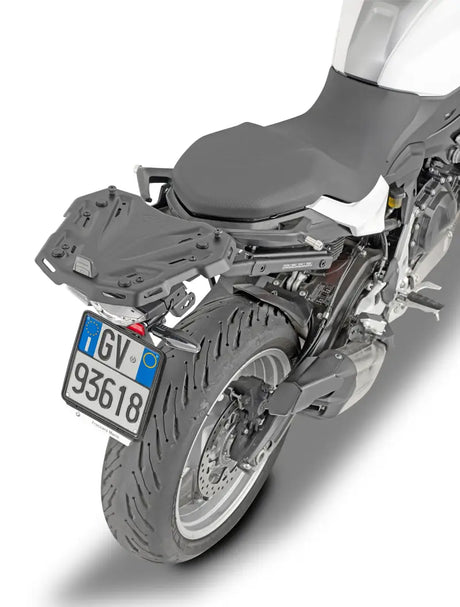 Motorcycle with rear rack and luggage plate showcasing 5137FZ Top Case Hardware BMW for hard luggage mounting