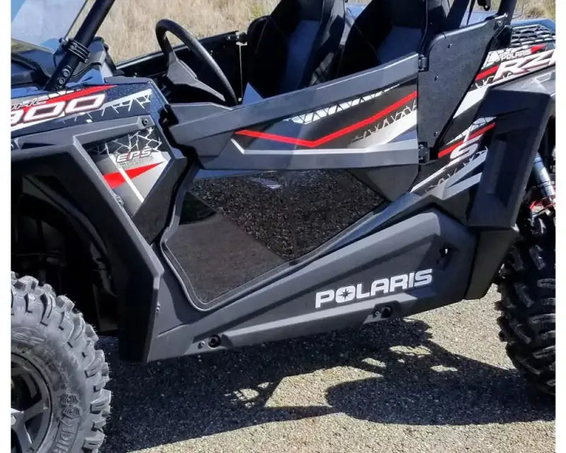 Black Polaris RZR with red and white spike lower door for Pol Rzr models