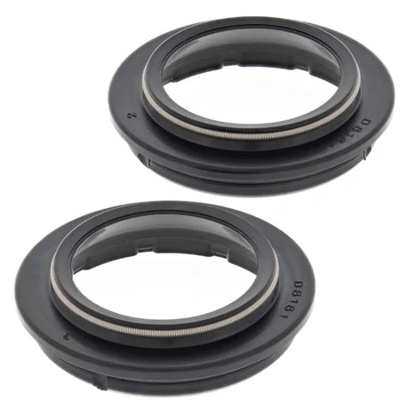 Two black circular dust seals from the 57-135 Fork Dust Seal Kit, perfect seal kit option