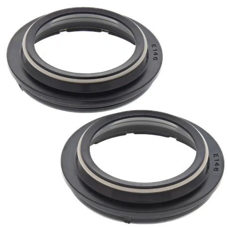 Two black rubber seals from 57-146 Fork Dust Seal Kit for fork dust seal replacement