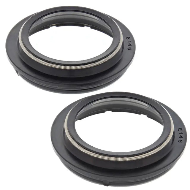 Two black rubber seals from 57-146 Fork Dust Seal Kit for fork dust seal replacement