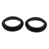 Two black automotive fork seal mounts from the 57-175 Fork Dust Seal Kit for fork seal replacement