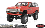 Red and white Toyota 4Runner RC car with blu fuel cell and -6an bulkhead part