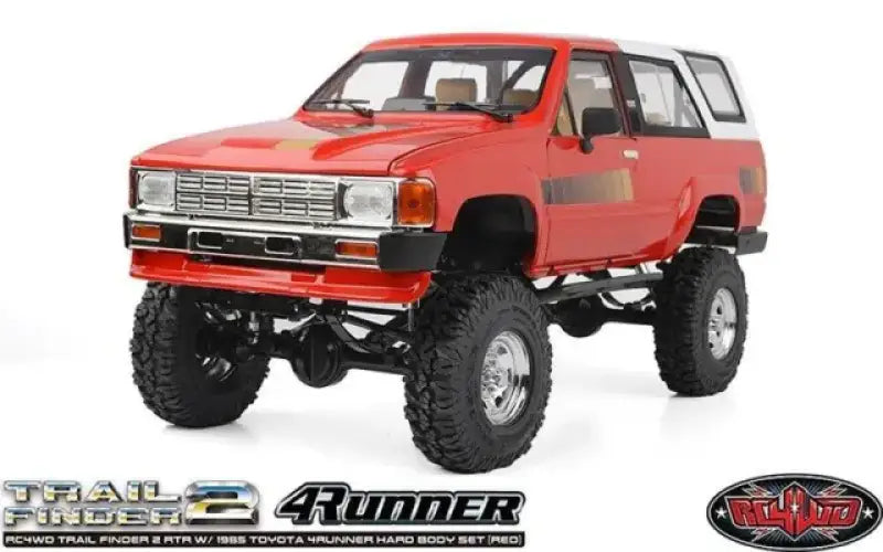 Red and white Toyota 4Runner RC car with blu fuel cell and -6an bulkhead part