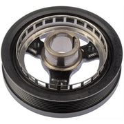 Black metal harmonic balancer on Dorman Pulley ensures smooth engine performance