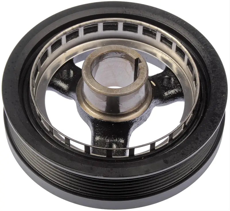 Black metal harmonic balancer on Dorman Pulley ensures smooth engine performance