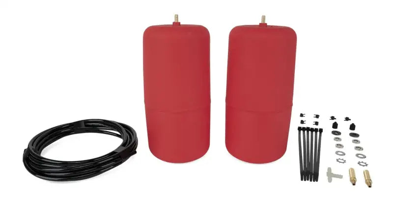 60863 Air Lift Air Lift 1000 Air Spring Kit - Enhance vehicle suspension with red air springs, hose, and installation hardware for improved handling and comfort.