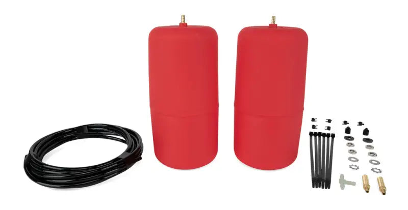 60863 Air Lift Air Lift 1000 Air Spring Kit components including air springs, tubing, and installation hardware.