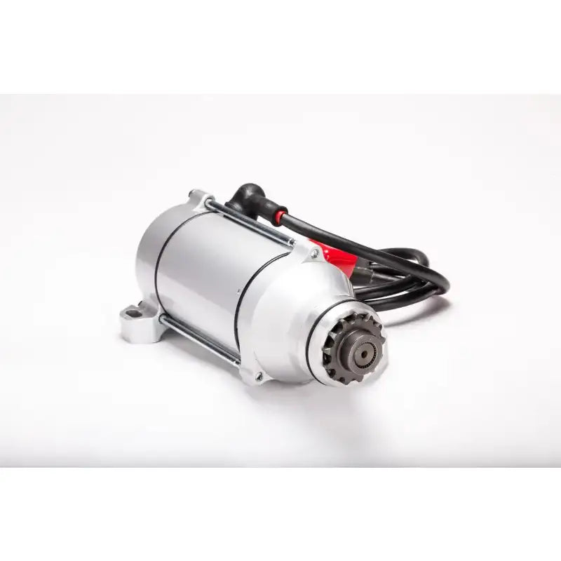 Silver starter motor with black cable and red connector for RV and truck parts