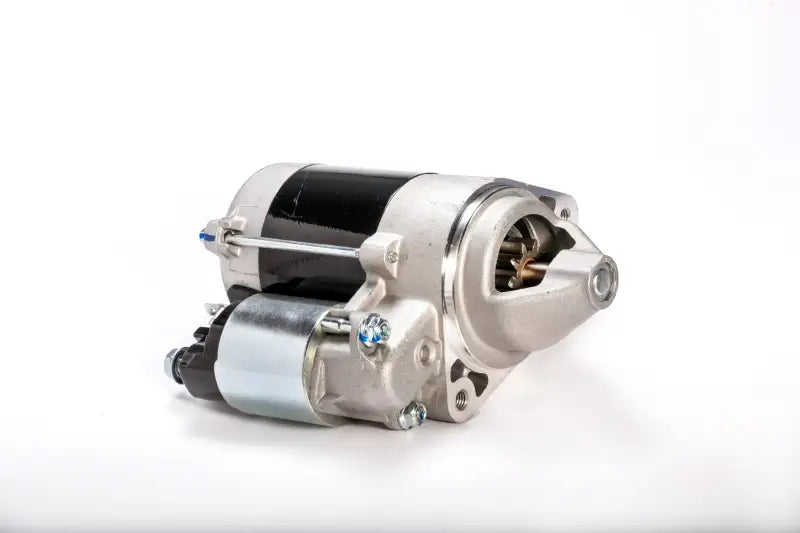 New 61-210 Starter Motor with black body, silver housing, and gear for truck parts